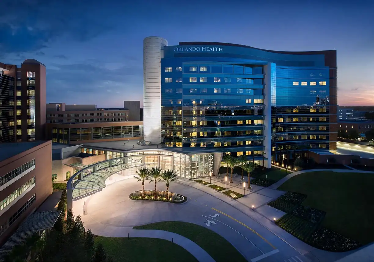 Orlando Health ORMC facility at night.