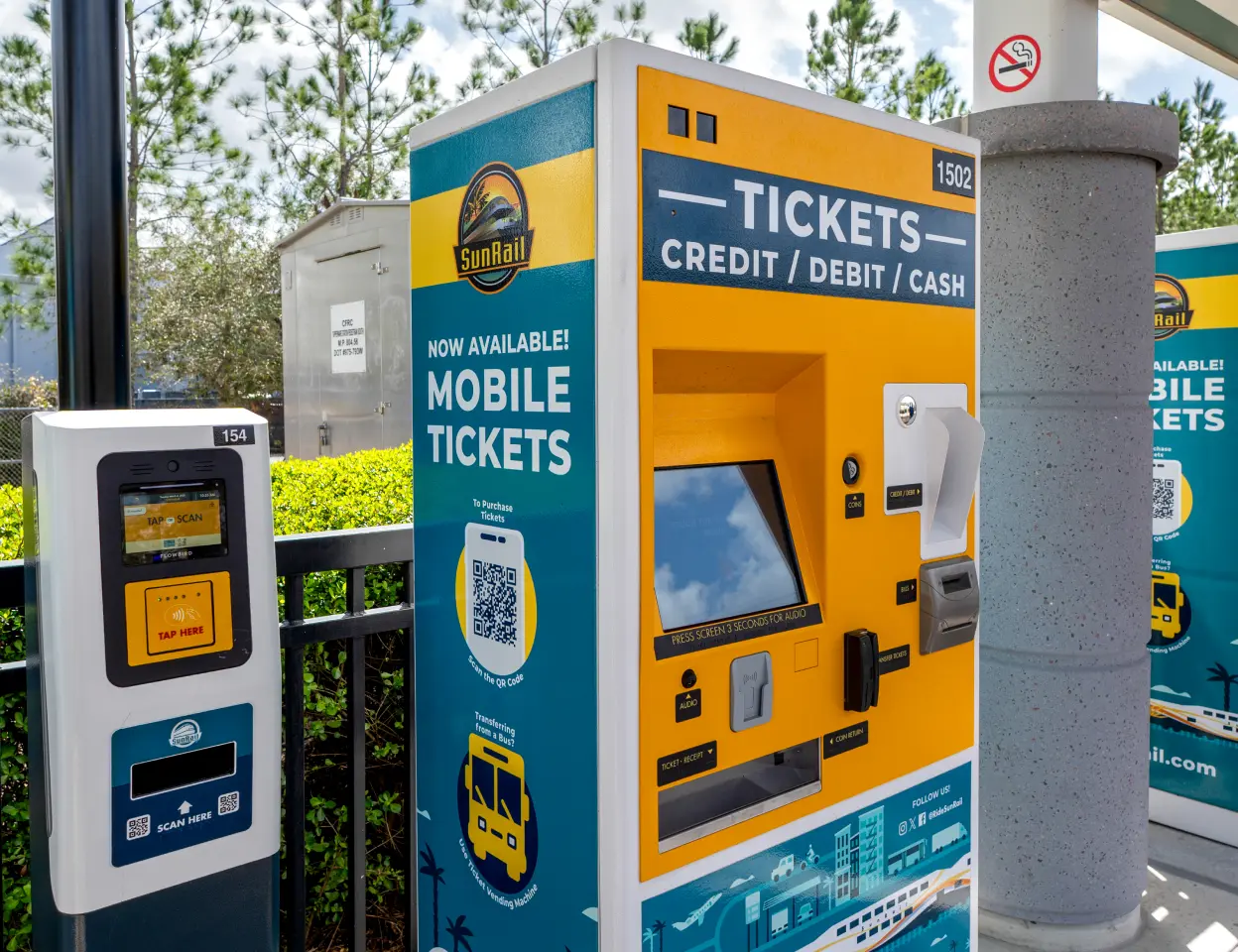 A ticket validator and a ticket vending machine on a SunRail Station platform.