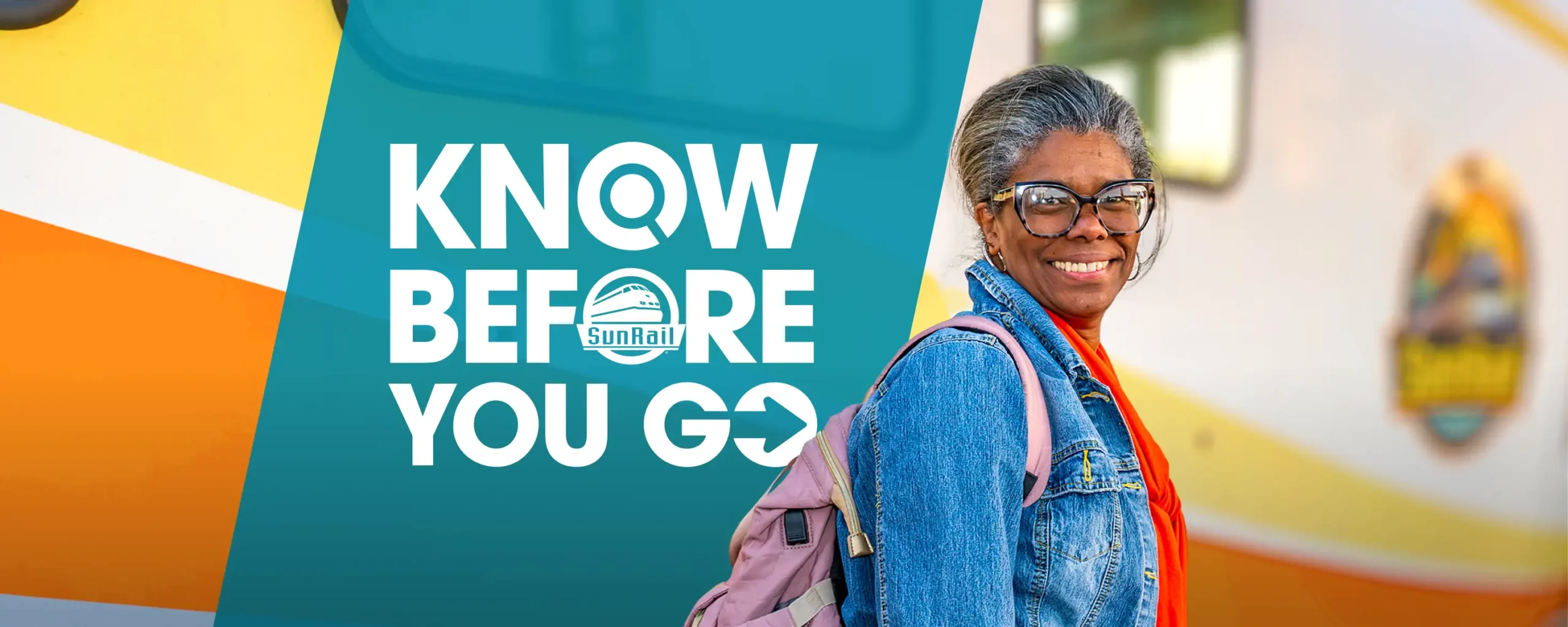 SunRail passenger standing in front of train.